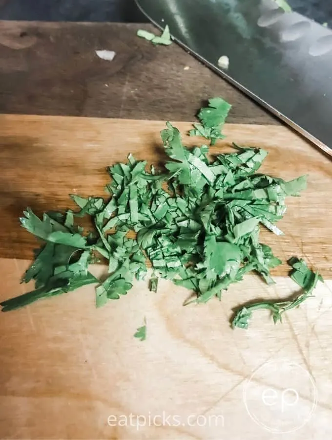 Chopped cilantro on cutting board