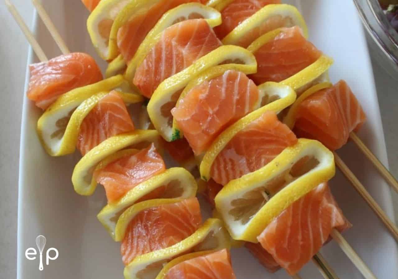 grilled salmon and lemon on skewers