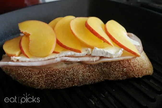 peach slices on brie panini