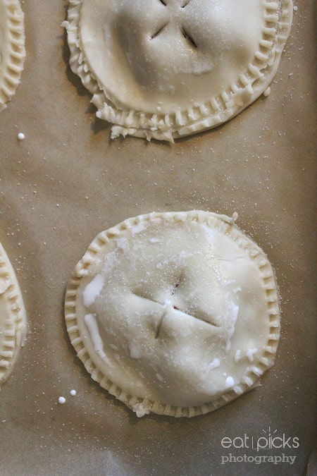 cherry hand pies on parchment