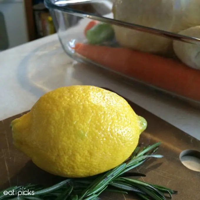lemon rosemary on cutting board