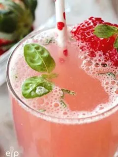 Strawberry Basil Spritzer in glass with straw