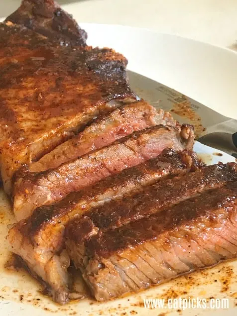 Sliced steak on plate 