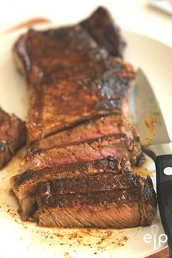 sliced steak on plate