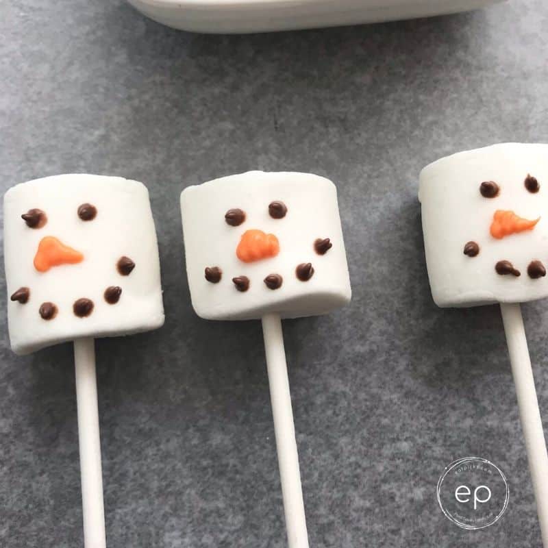 Marshmallow snowman crafts with eyes, smile and noses