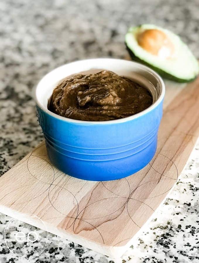 avocado chocolate mousse in blue bowl