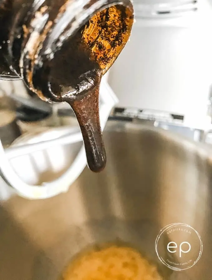 Vanilla bean paste added to mixing bowl