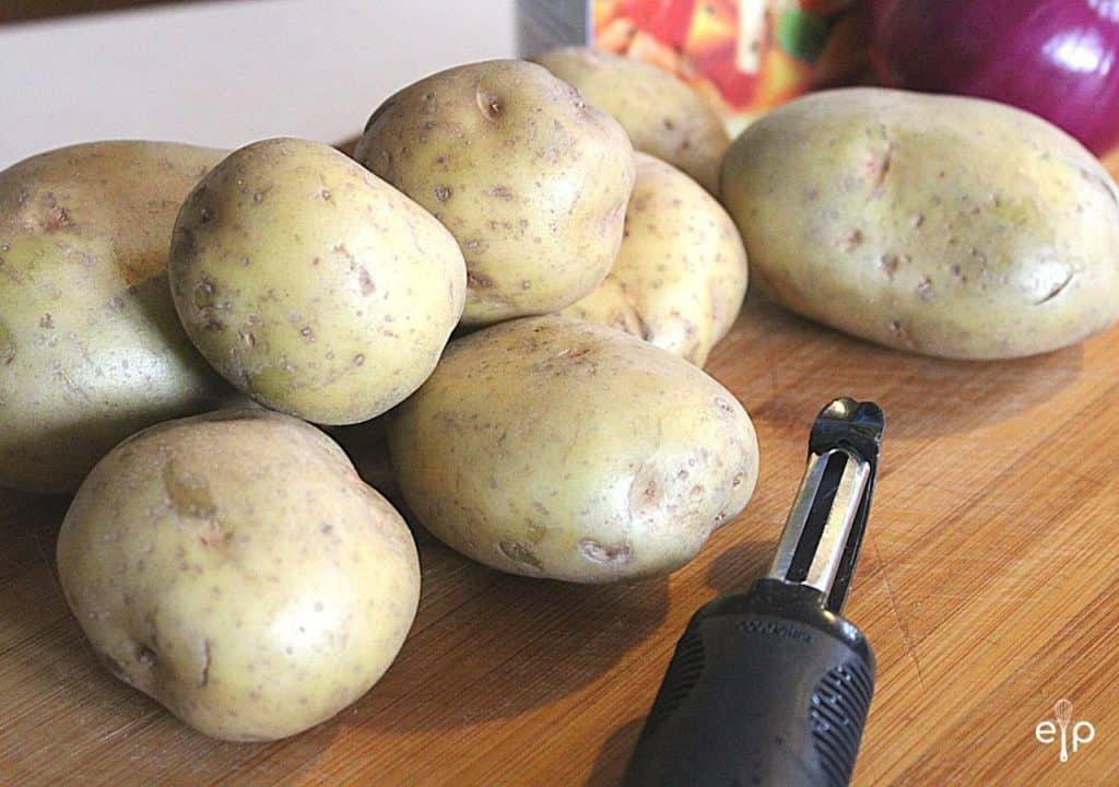 Potatoes on cutting board