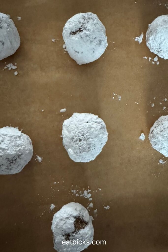 cookie balls on baking sheet